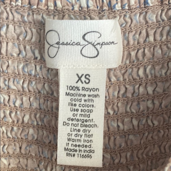 Jessica Simpson Pink Smocked Jumpsuit with Puff Sleeves - Picture 2 of 9